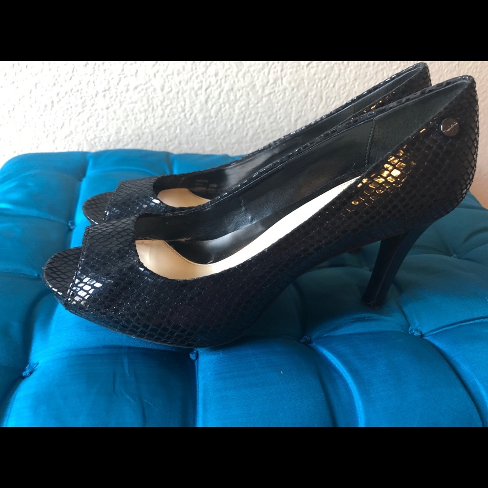 Calvin Klein Kyle Classic Python Print Pumps.